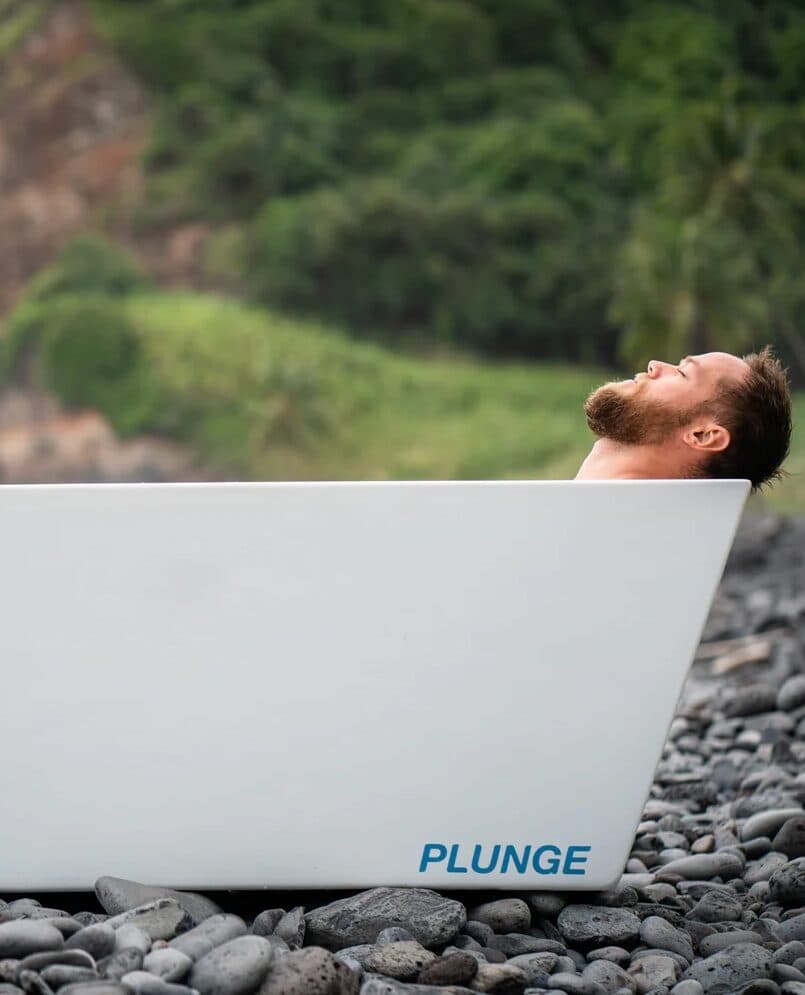 man in a cold plunge tub